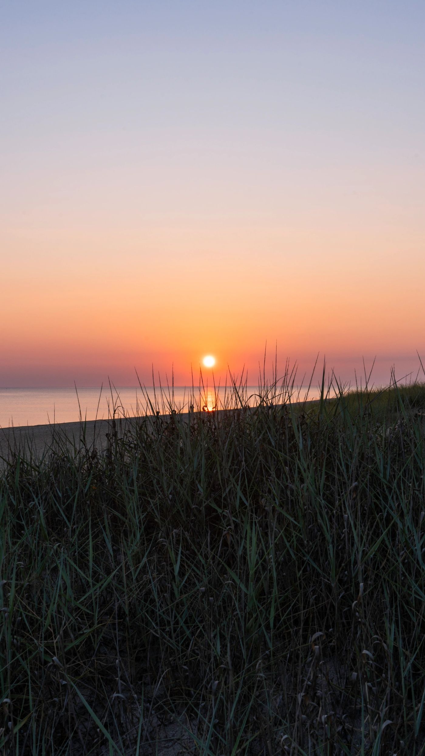Vibrant sunrise over the ocean — Volpe Psychological Services telehealth psychology
